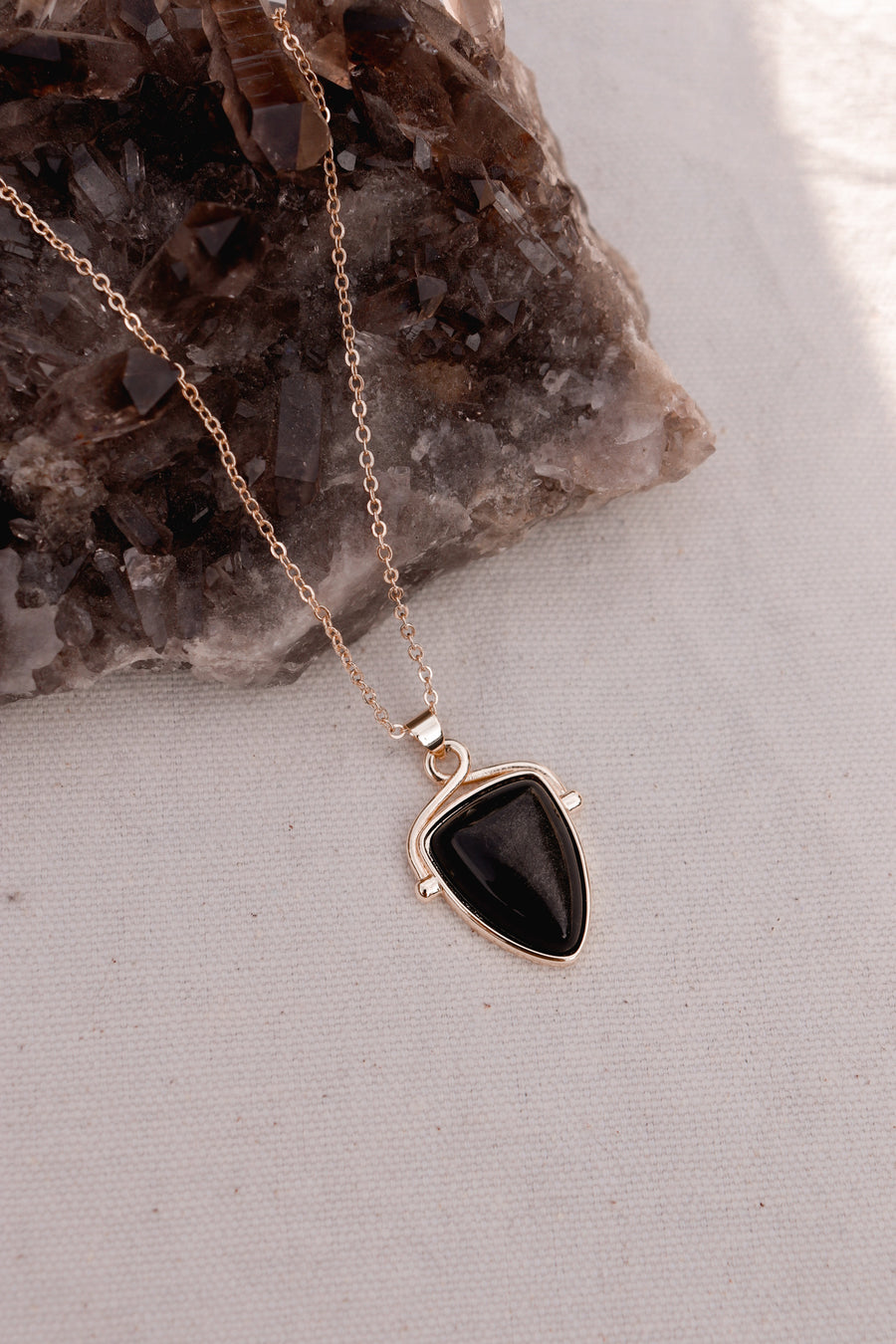 Shielded | golden obsidian shield necklace